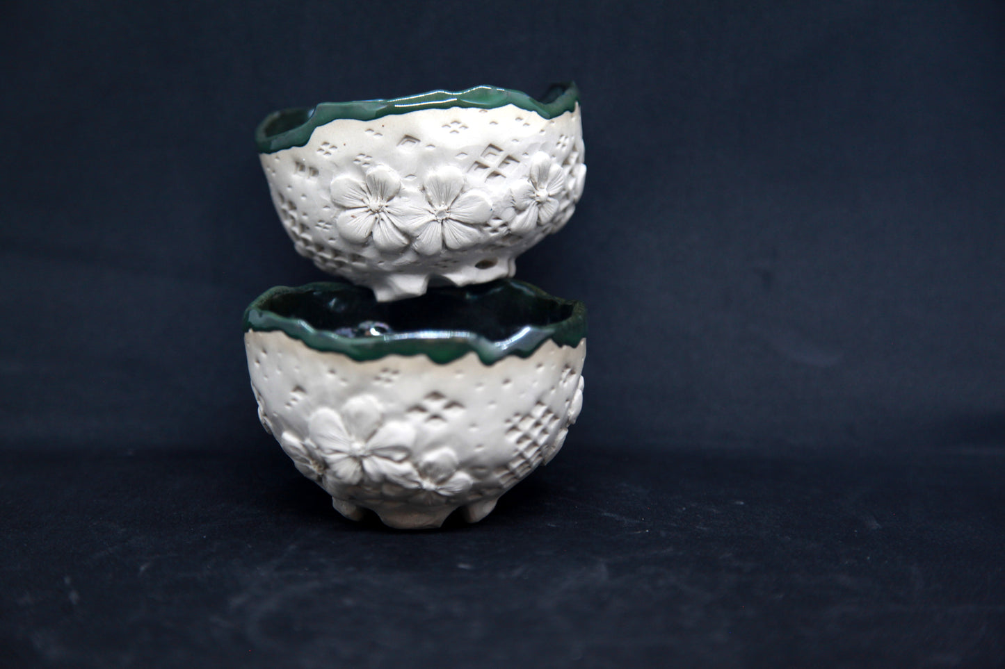 Metal green cups on white clay - flower patterns