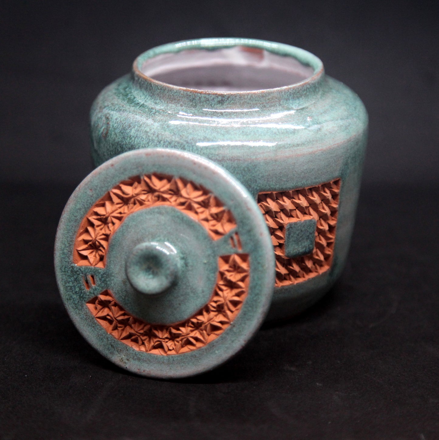 Celadon gree tea box on red clay - braiding pattern