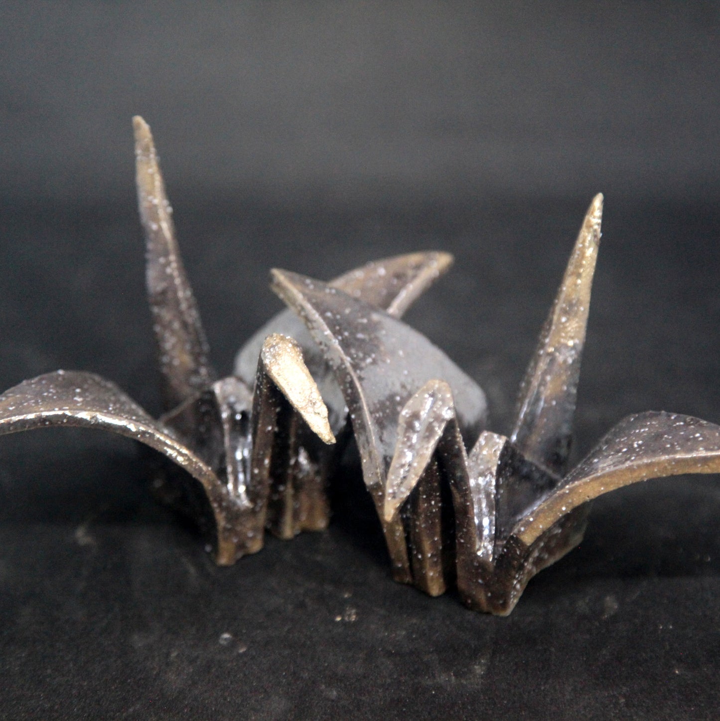 Black birds with golden reflections - origami pattern