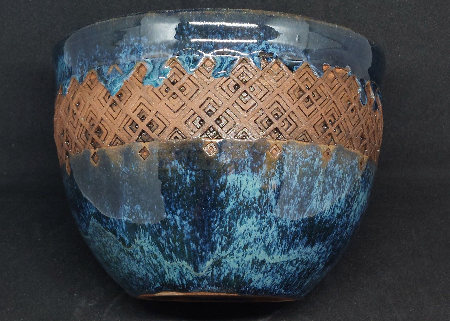 Blue bowl on red clay - Scottish pattern