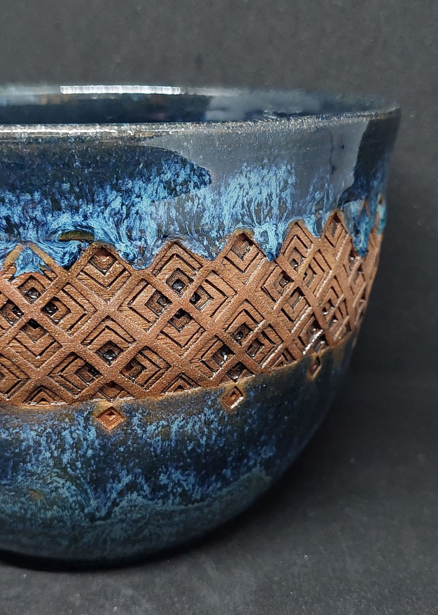 Blue bowl on red clay - Scottish pattern