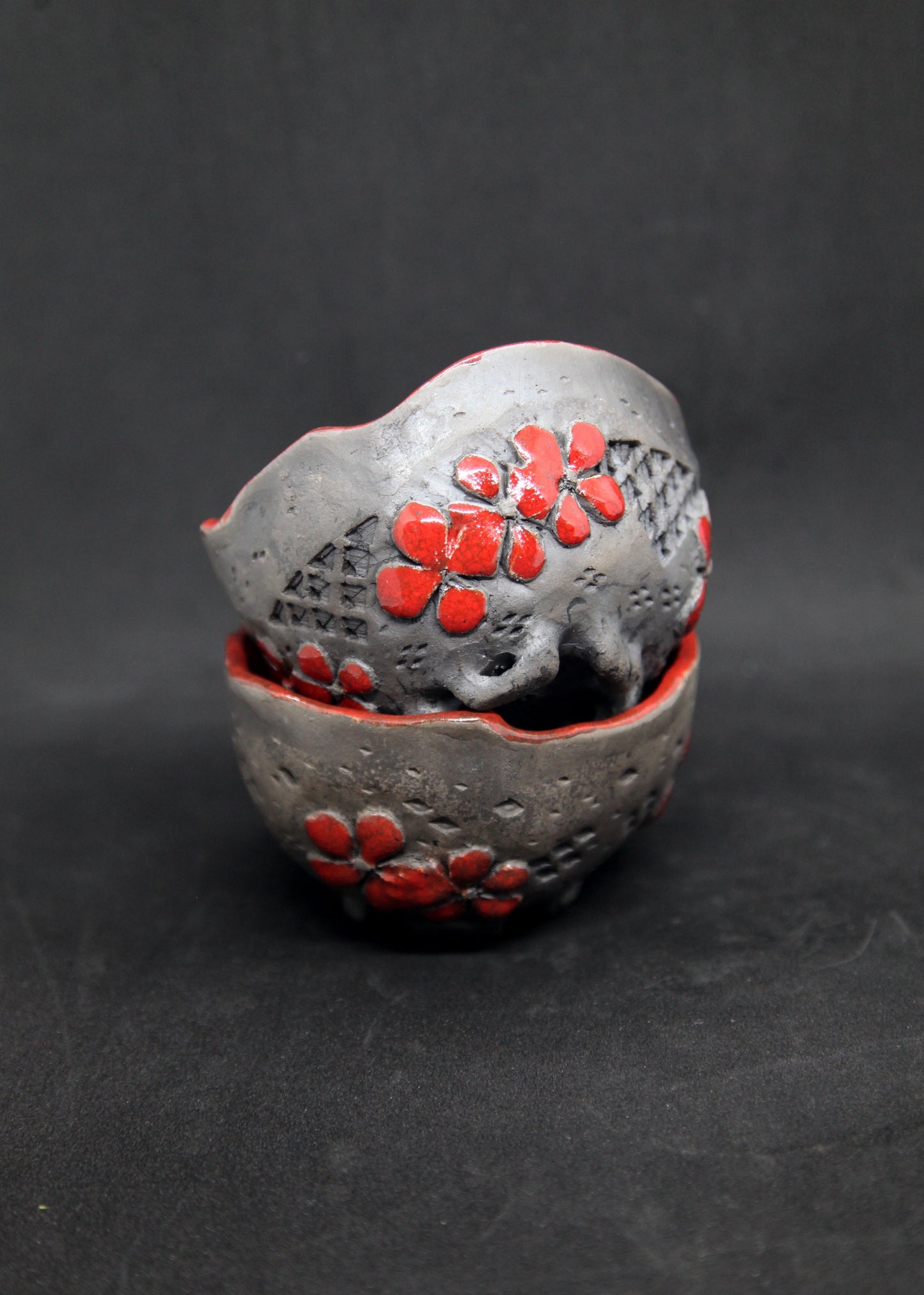 Red raku cups - flower patterns