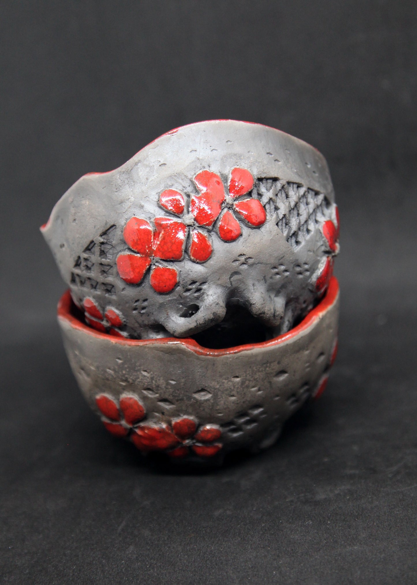 Red raku cups - flower patterns