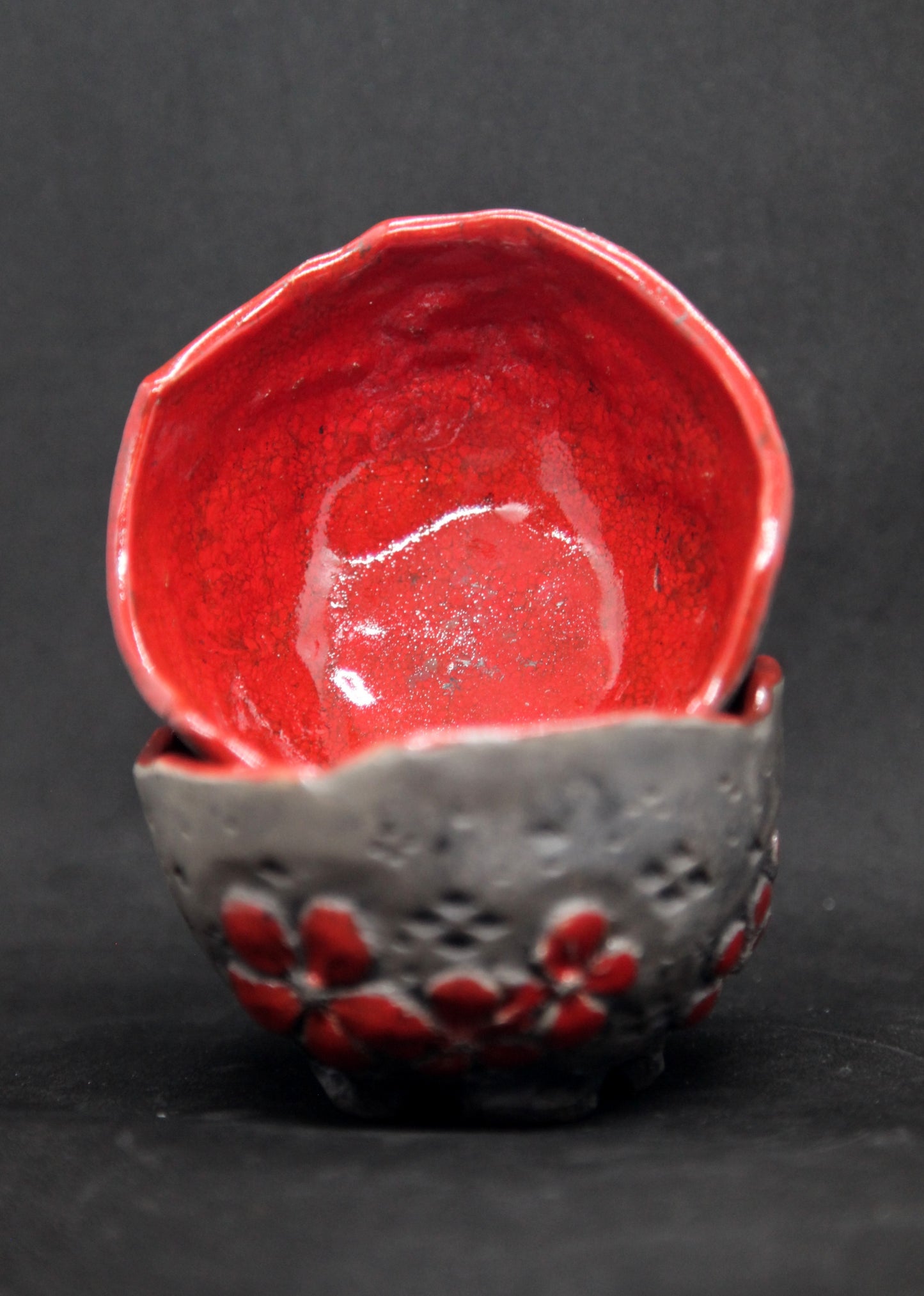 Red raku cups - flower patterns