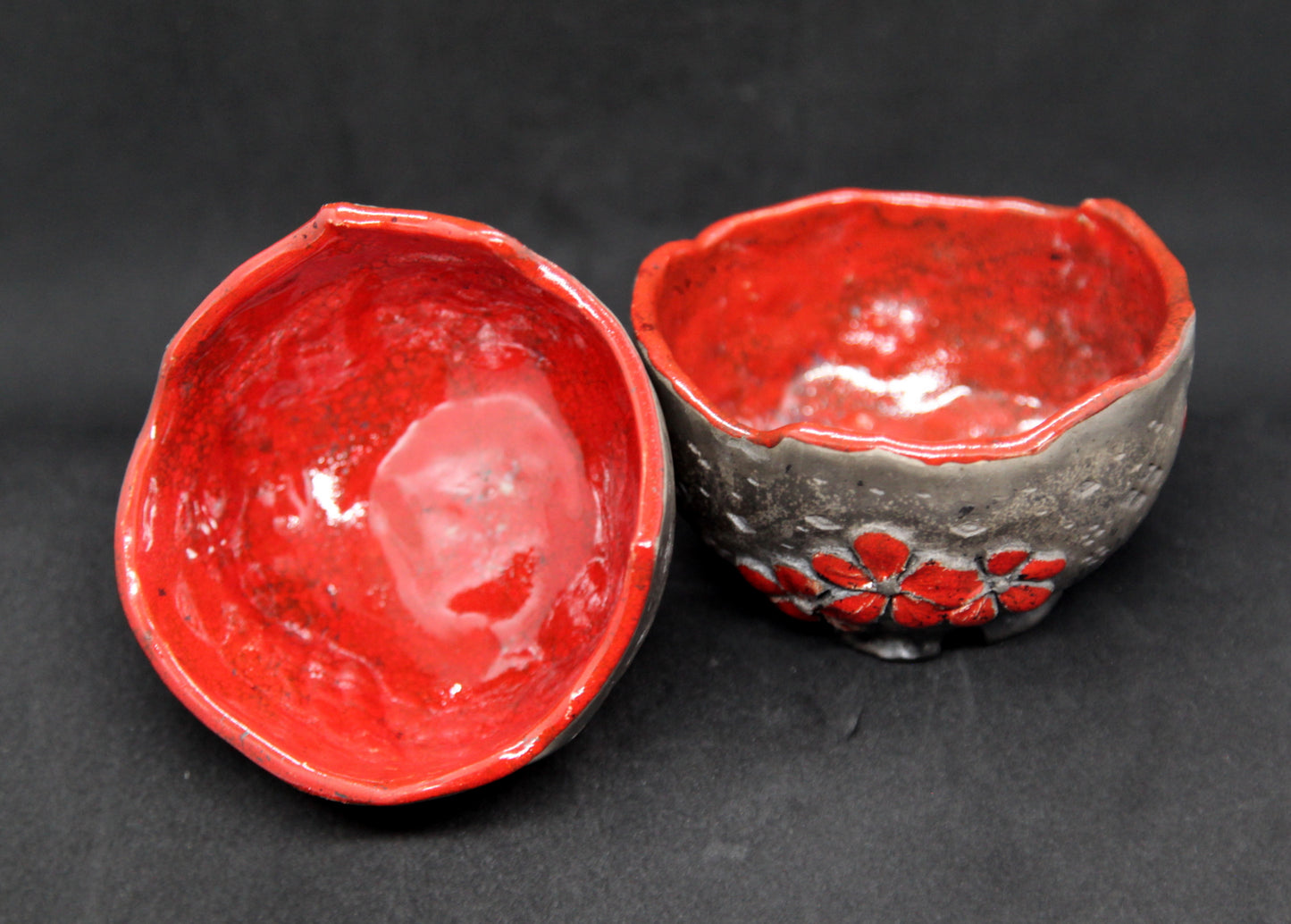 Red raku cups - flower patterns