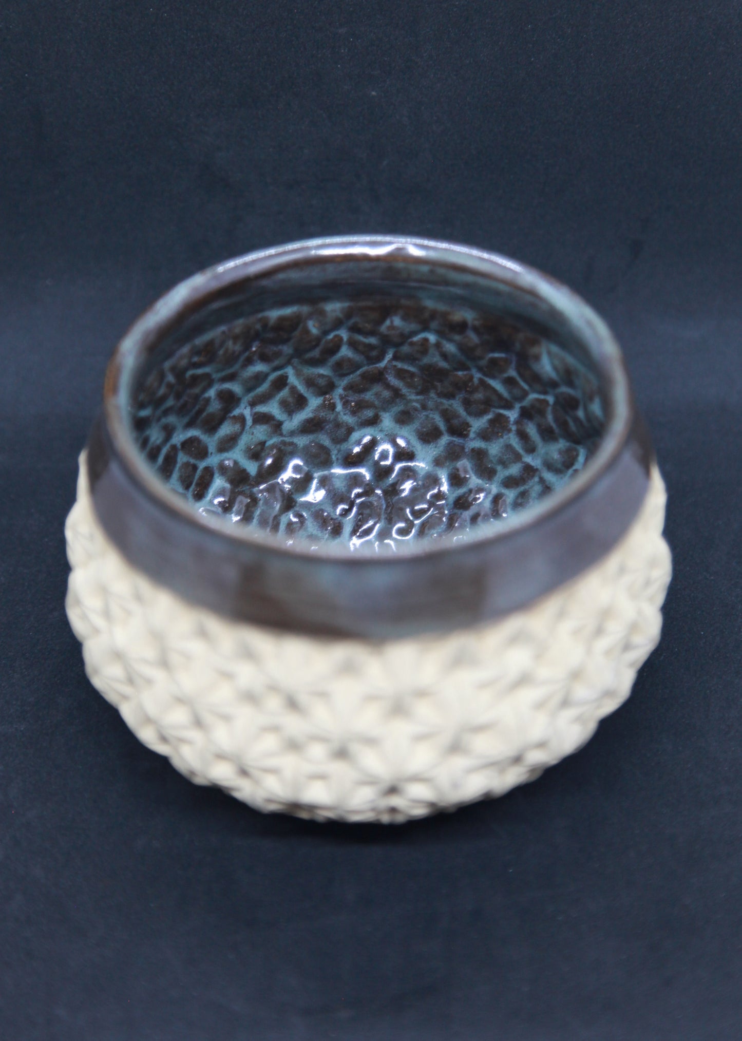 Brown and green bowl on ivory clay - origami pattern