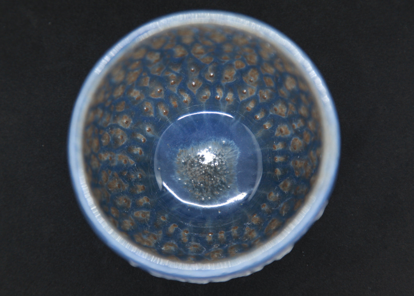 Blue bowl on gray clay, white engobe - hydrangea pattern
