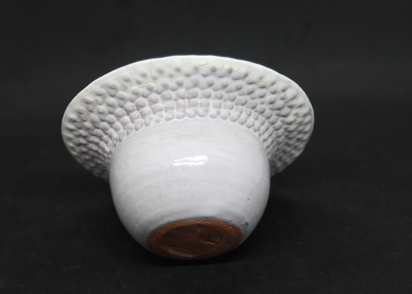 Blue and white marli bowl on red glaze - braiding pattern