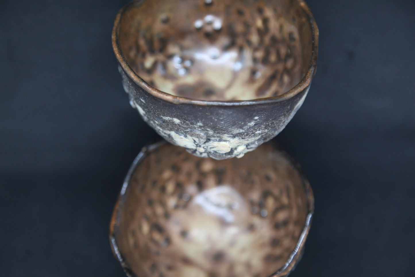 Caramel cups on black clay - flower patterns