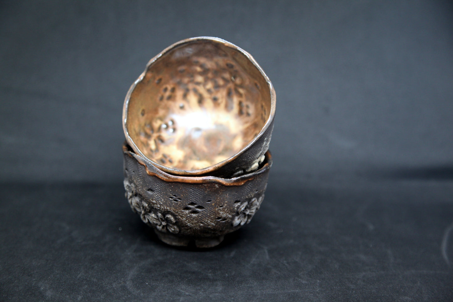 Caramel cups on black clay - flower patterns