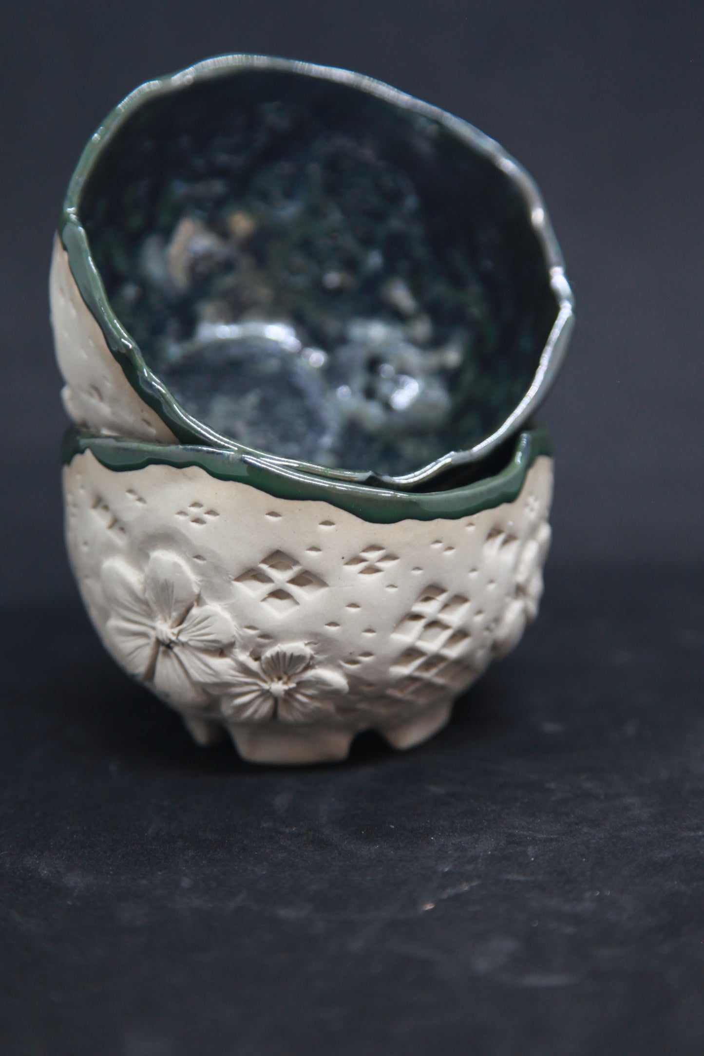 Metal green cups on white clay - flower patterns