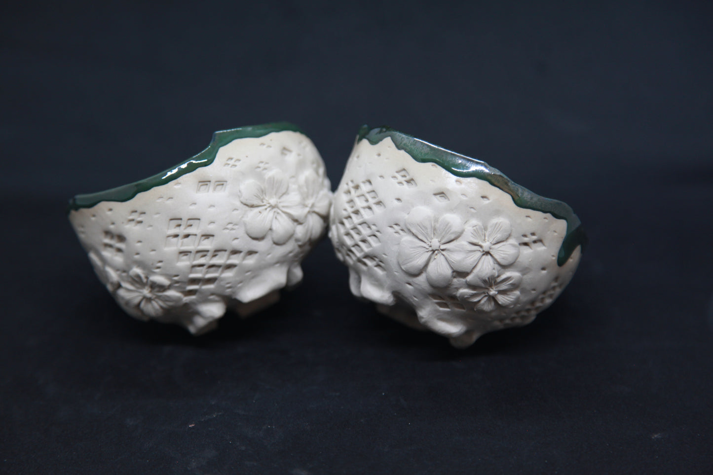 Metal green cups on white clay - flower patterns