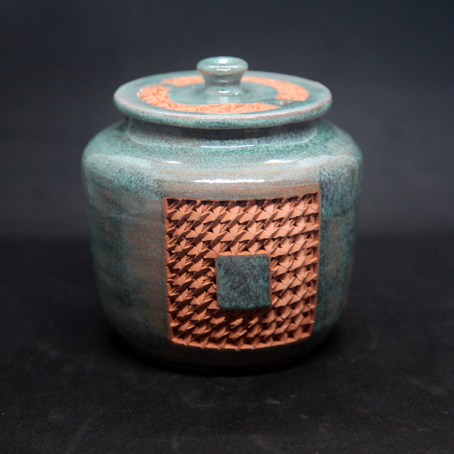 Celadon gree tea box on red clay - braiding pattern