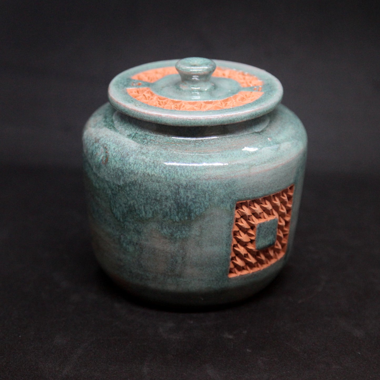 Celadon gree tea box on red clay - braiding pattern