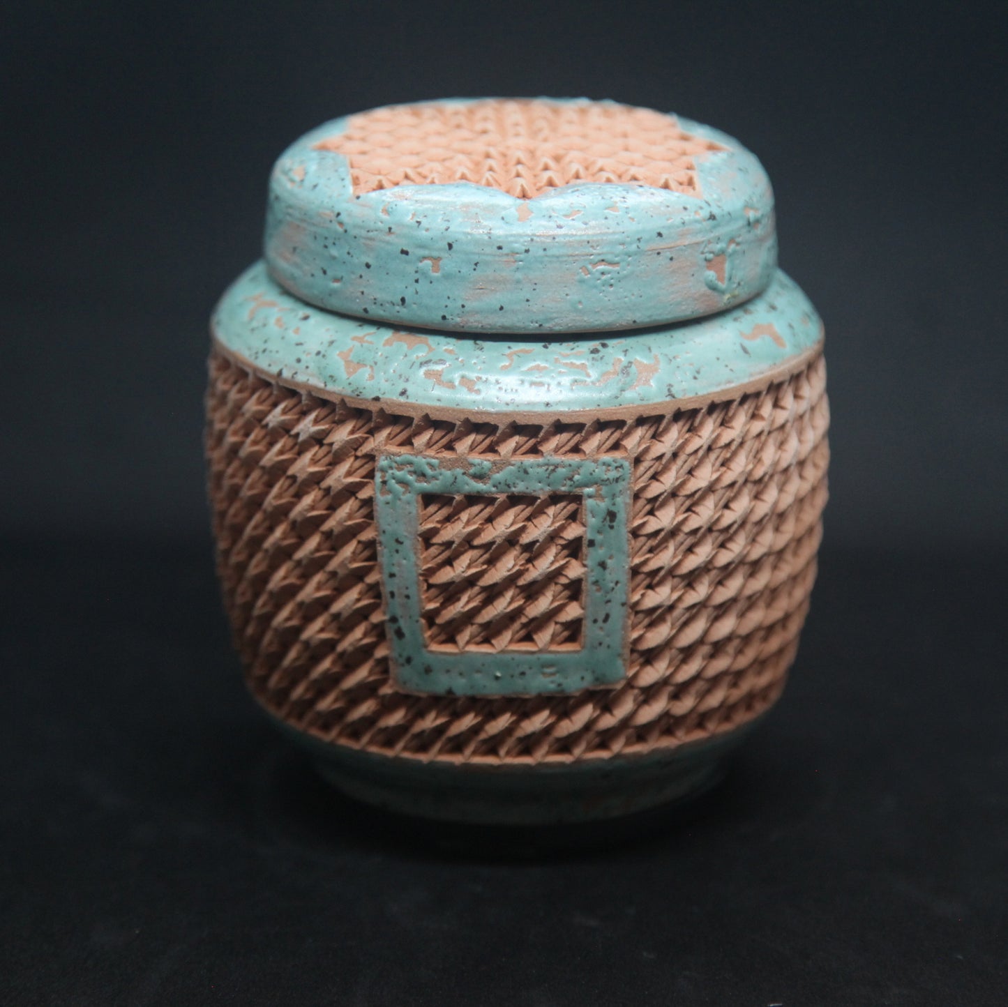 Deepwater blue tea box on red clay - braiding pattern