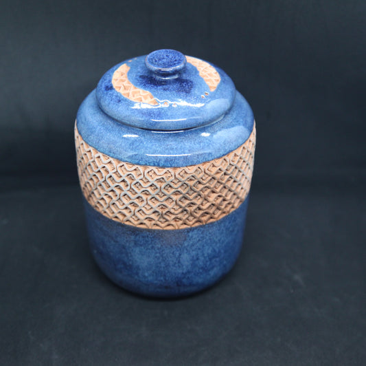 Turquoise blue tea box on red clay - braiding pattern