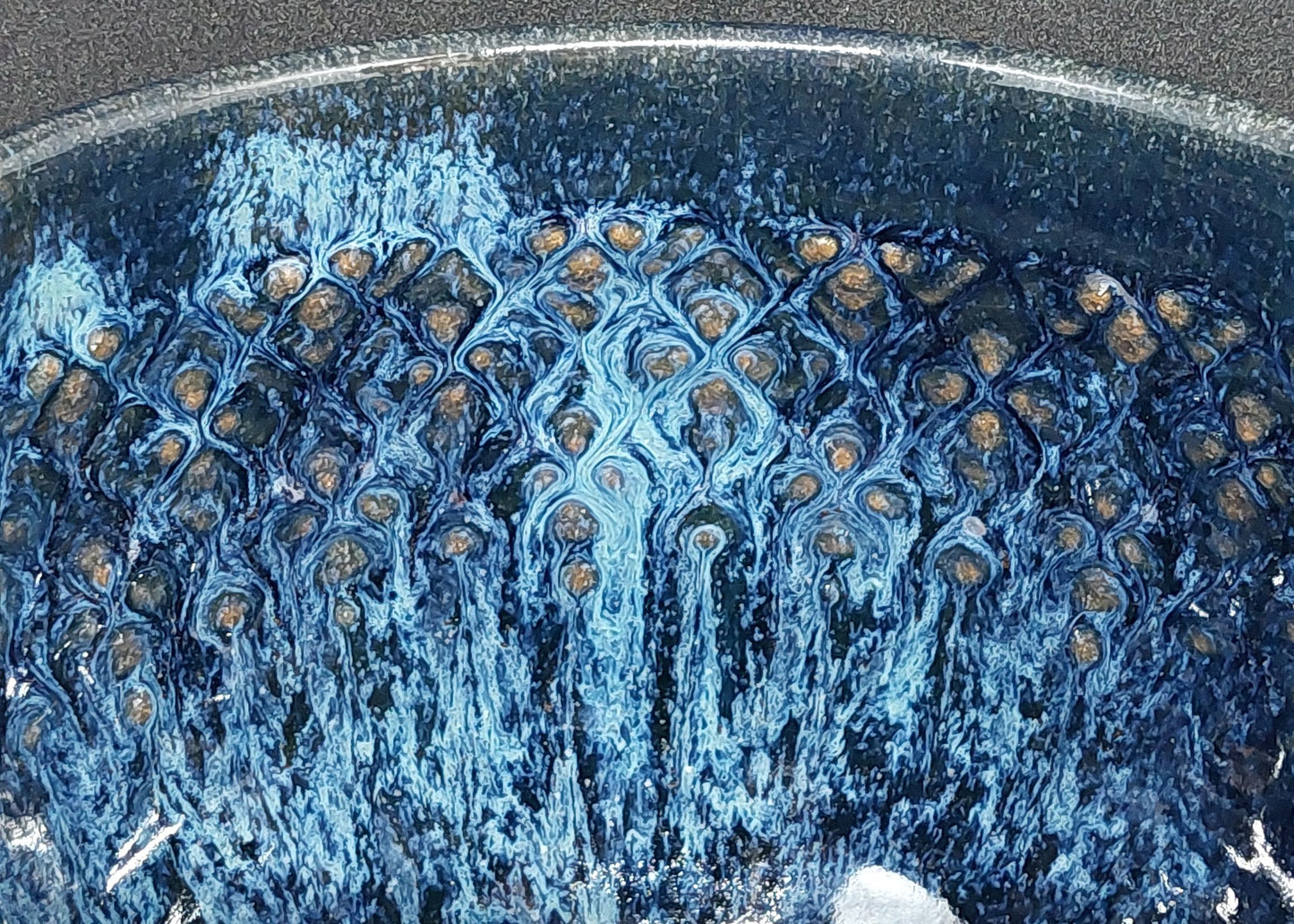 Blue bowl on red clay - Scottish pattern