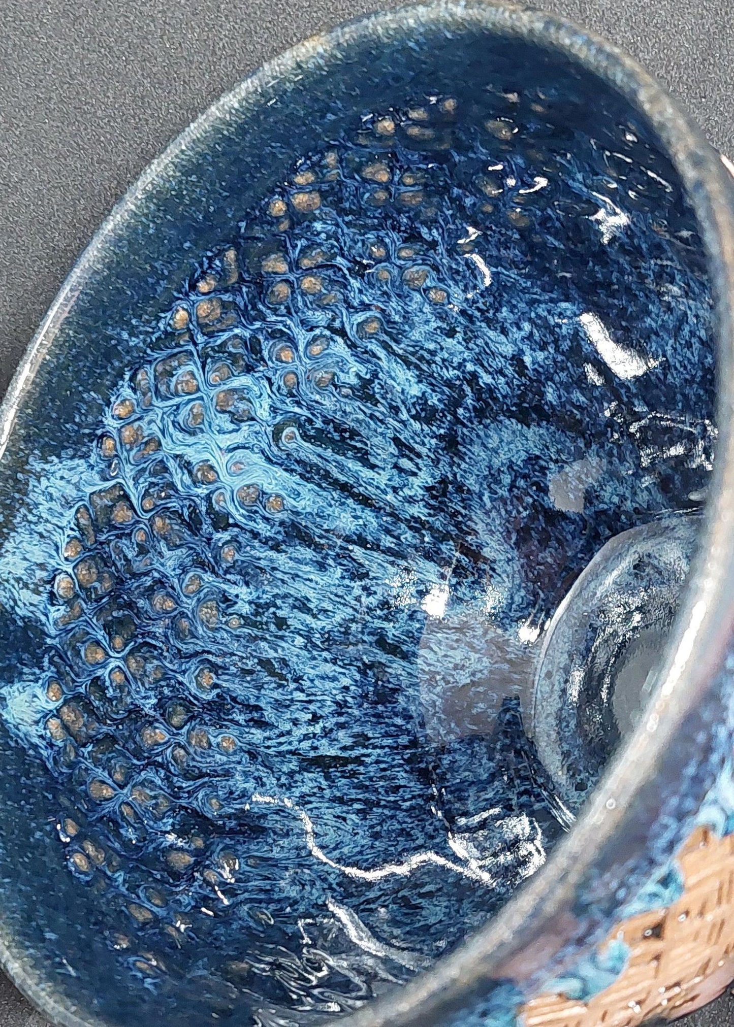 Blue bowl on red clay - Scottish pattern