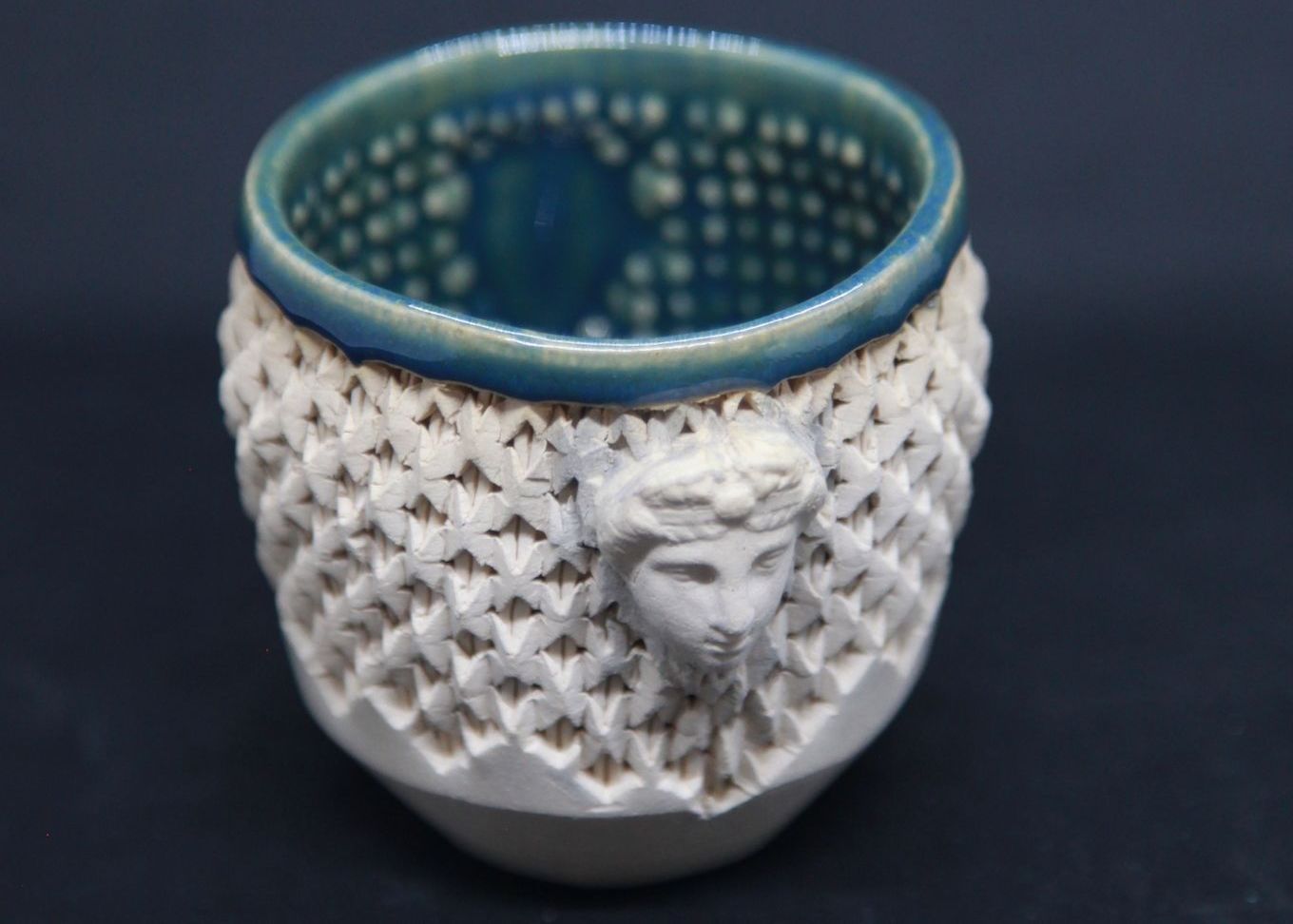 Green cup on white clay, Diane face - braiding pattern