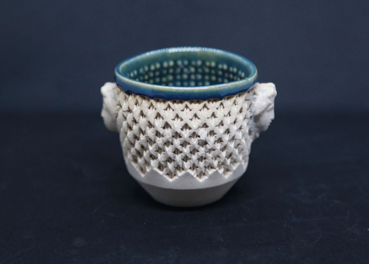 Green cup on white clay, Diane face - braiding pattern