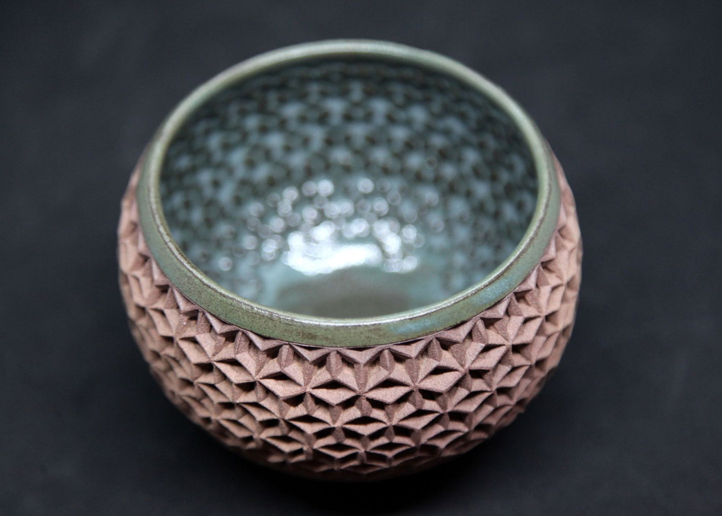 Green bowl on buff clay - flowers of life pattern