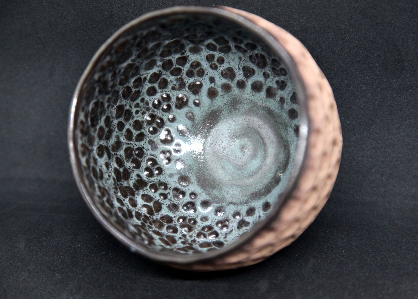 Blue and brown bowl on buff clay - prism pattern