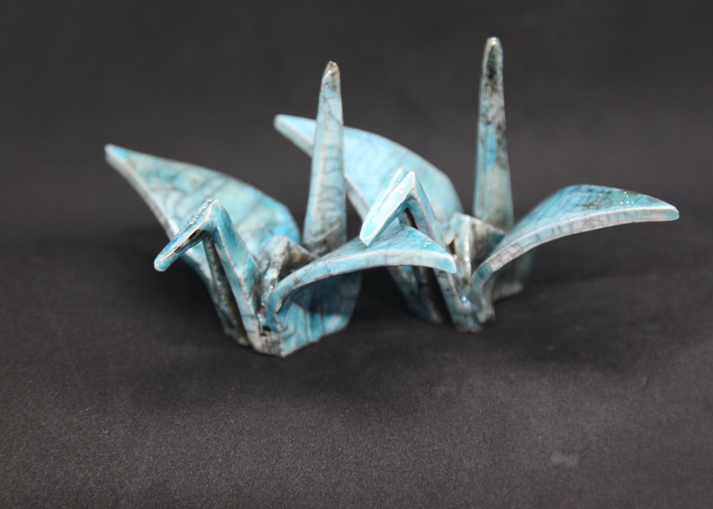 Turquoise raku birds - origami pattern