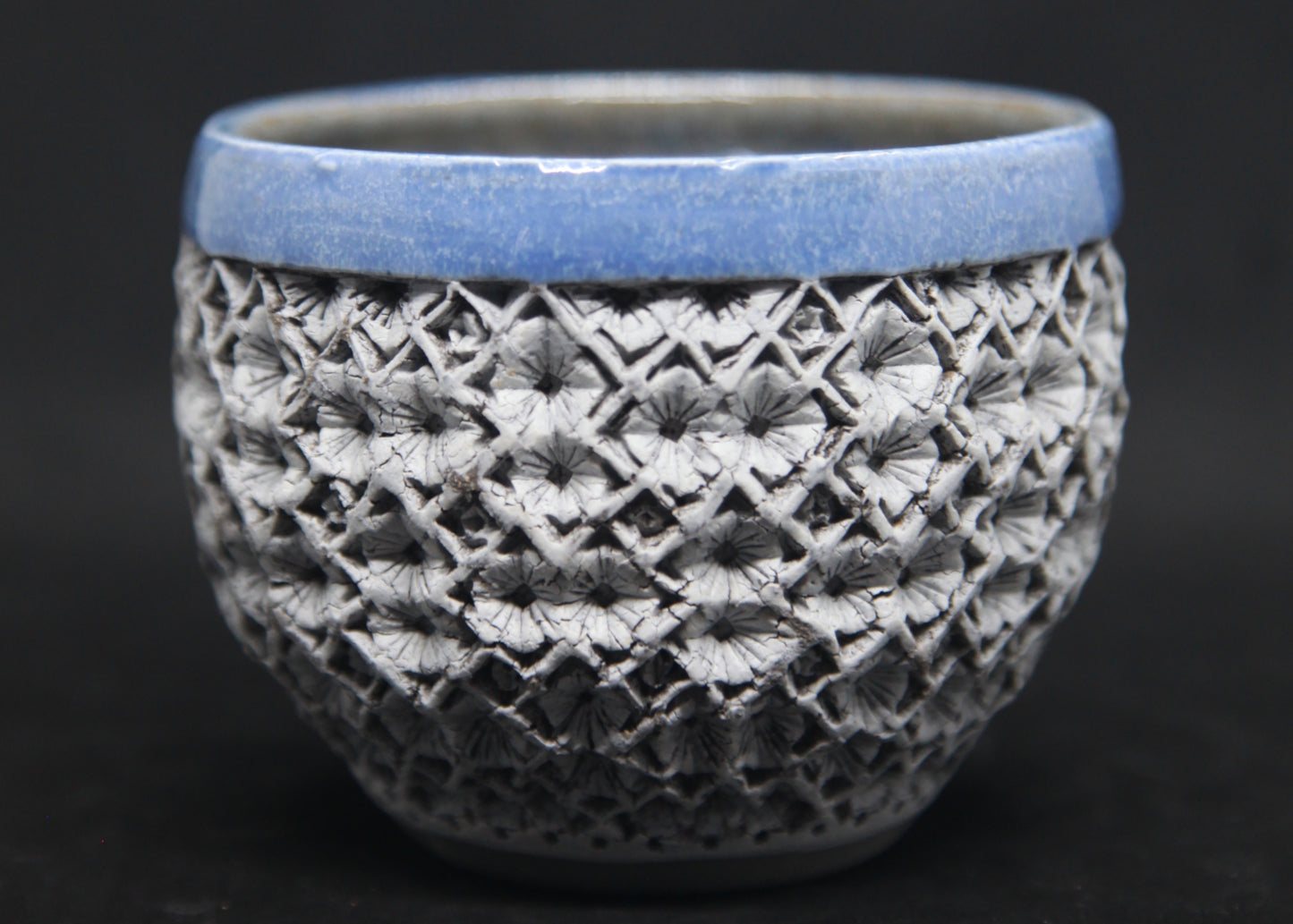Blue bowl on gray clay, white engobe - hydrangea pattern
