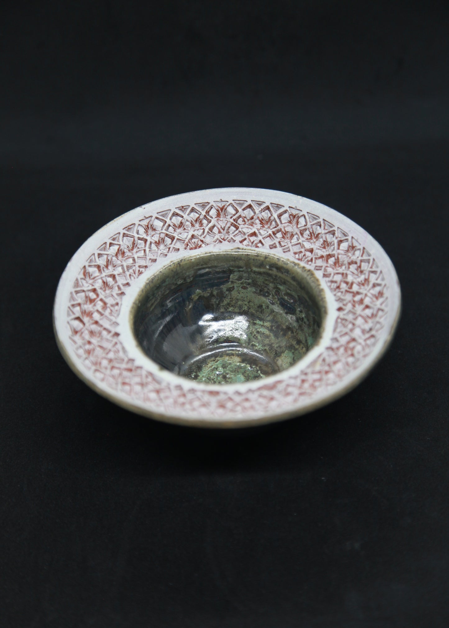 Pearl green and white marli bowl on red glaze - hydrangea motif