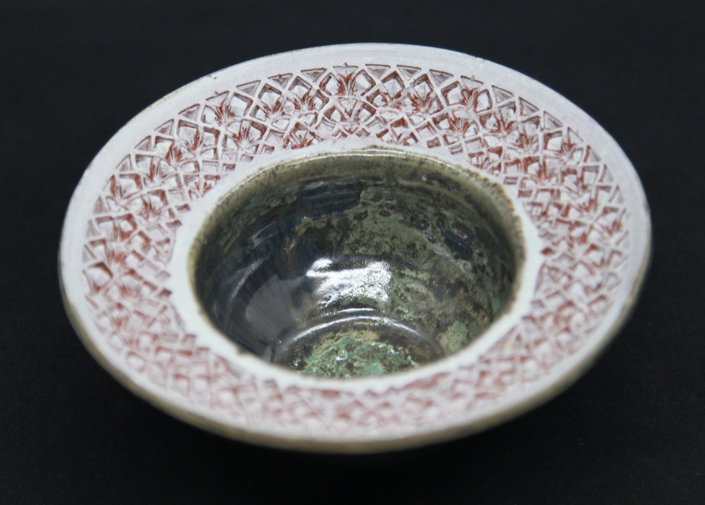 Pearl green and white marli bowl on red glaze - hydrangea motif