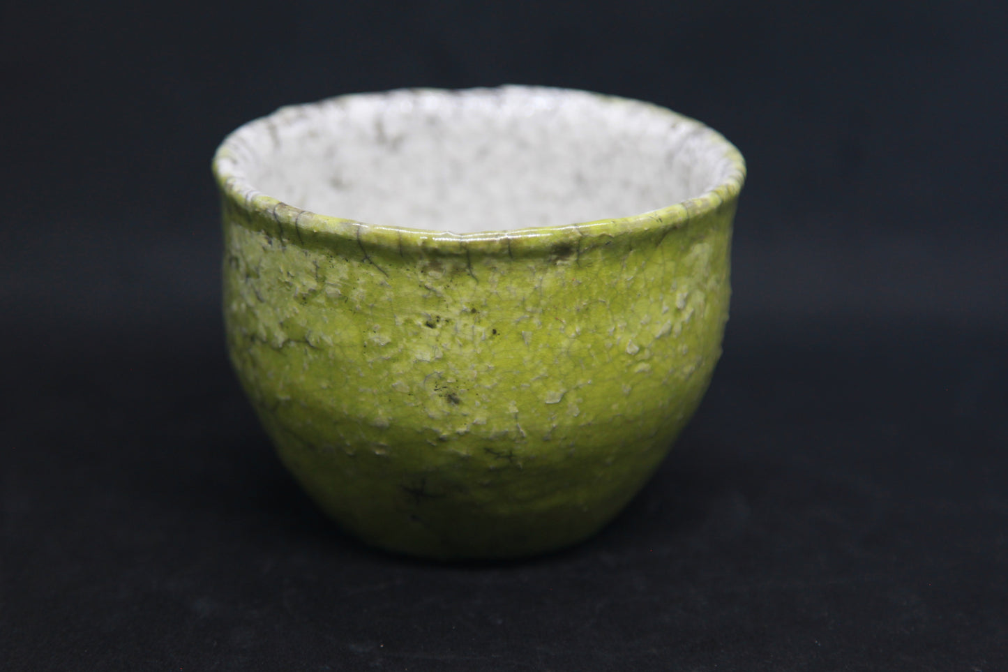 Anise green and white bowl in raku