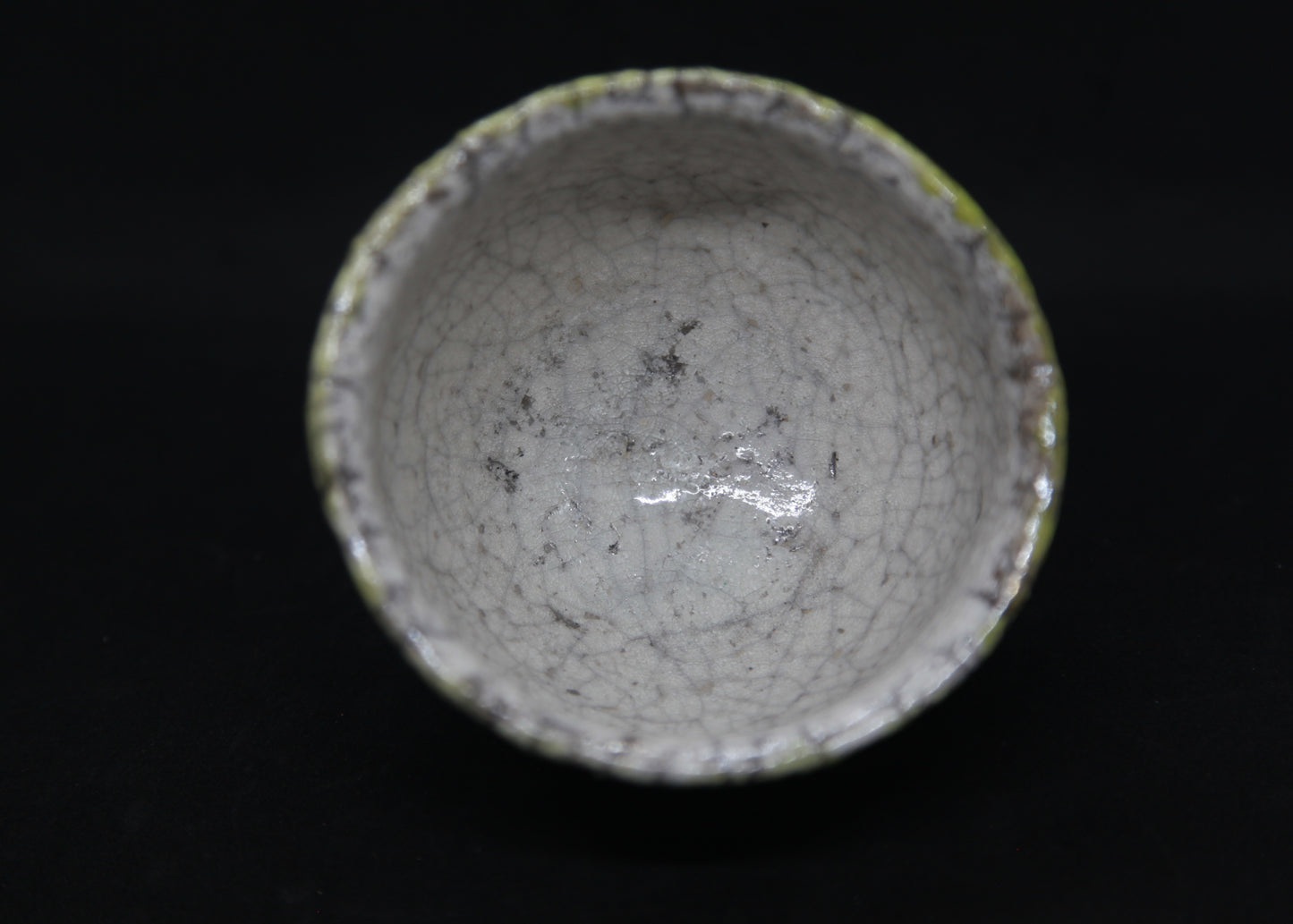 Anise green and white bowl in raku