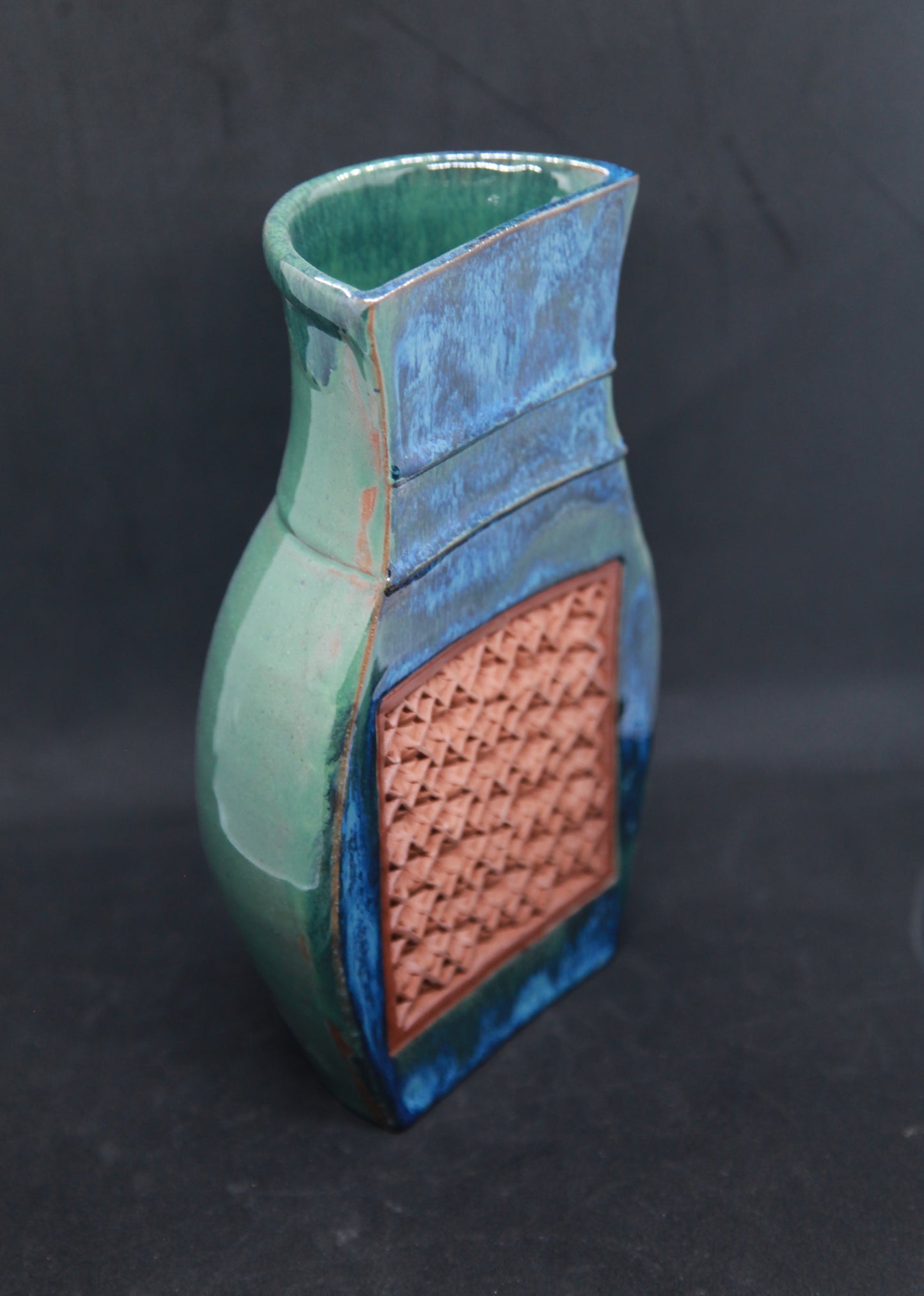 Green and blue vase (half shape) on red glaze - hydrangea pattern