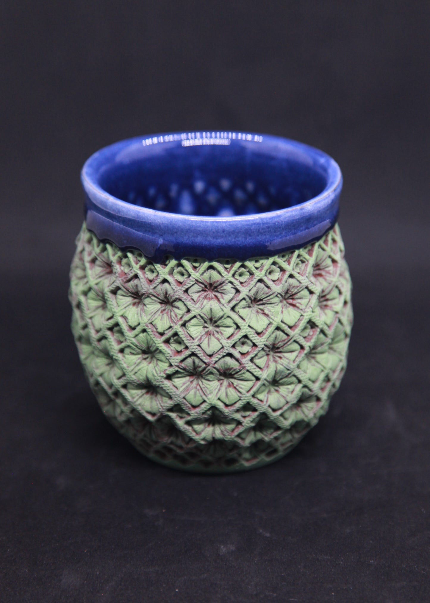 Blue bowl on red clay, green engobe - hydrangea motif