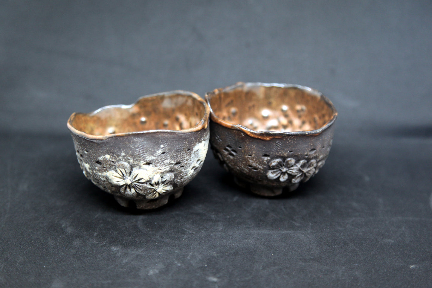 Caramel cups on black clay - flower patterns