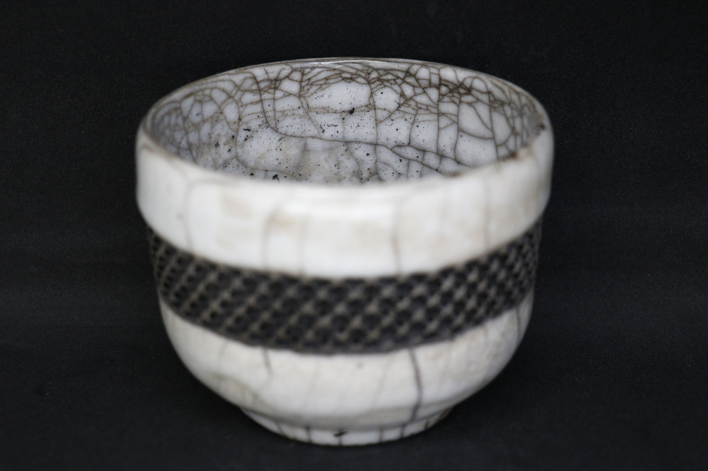 White and black raku mug